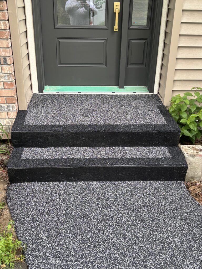 rubber paving grey with black border installed on front stairs and entryway