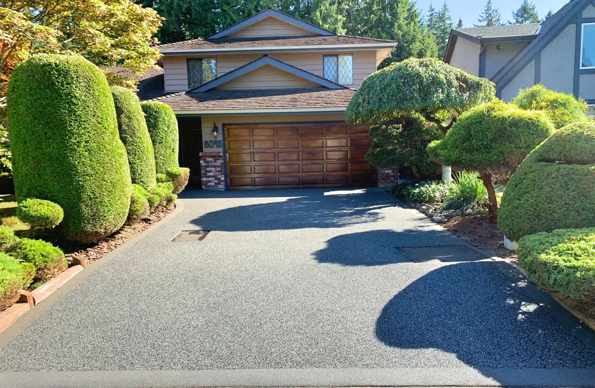 Grey and black rubber driveway with grey border, Surrey, BC